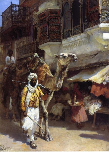 Man Leading A Camel